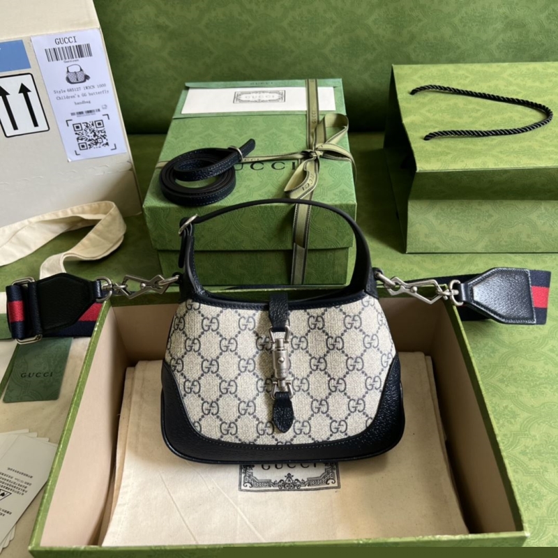 G*u*i top handle bags
